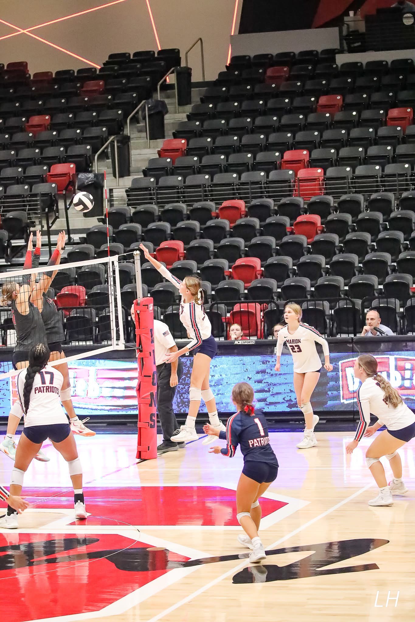 Marlee attacking in a white jersey